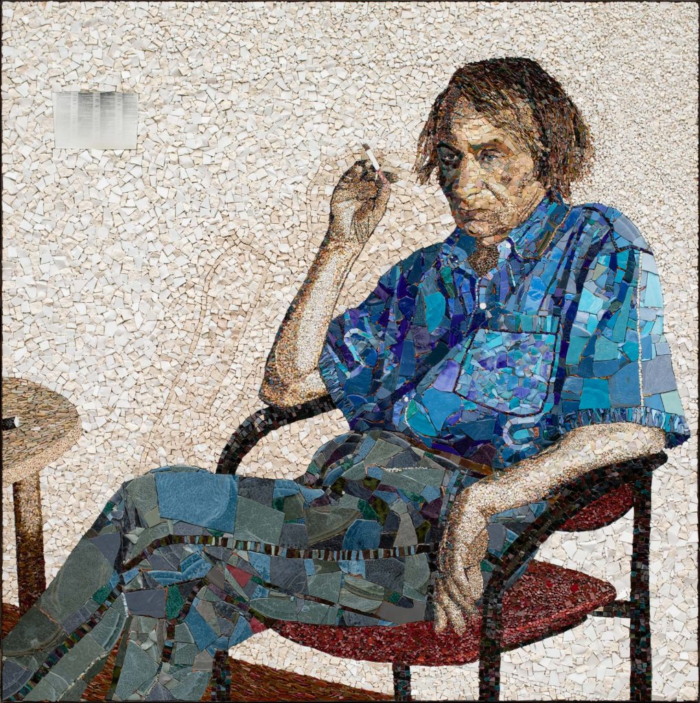 Contemporary mosaic portrait of Michel Houellebecq by Clément Mitéran, created using smalt and marble.